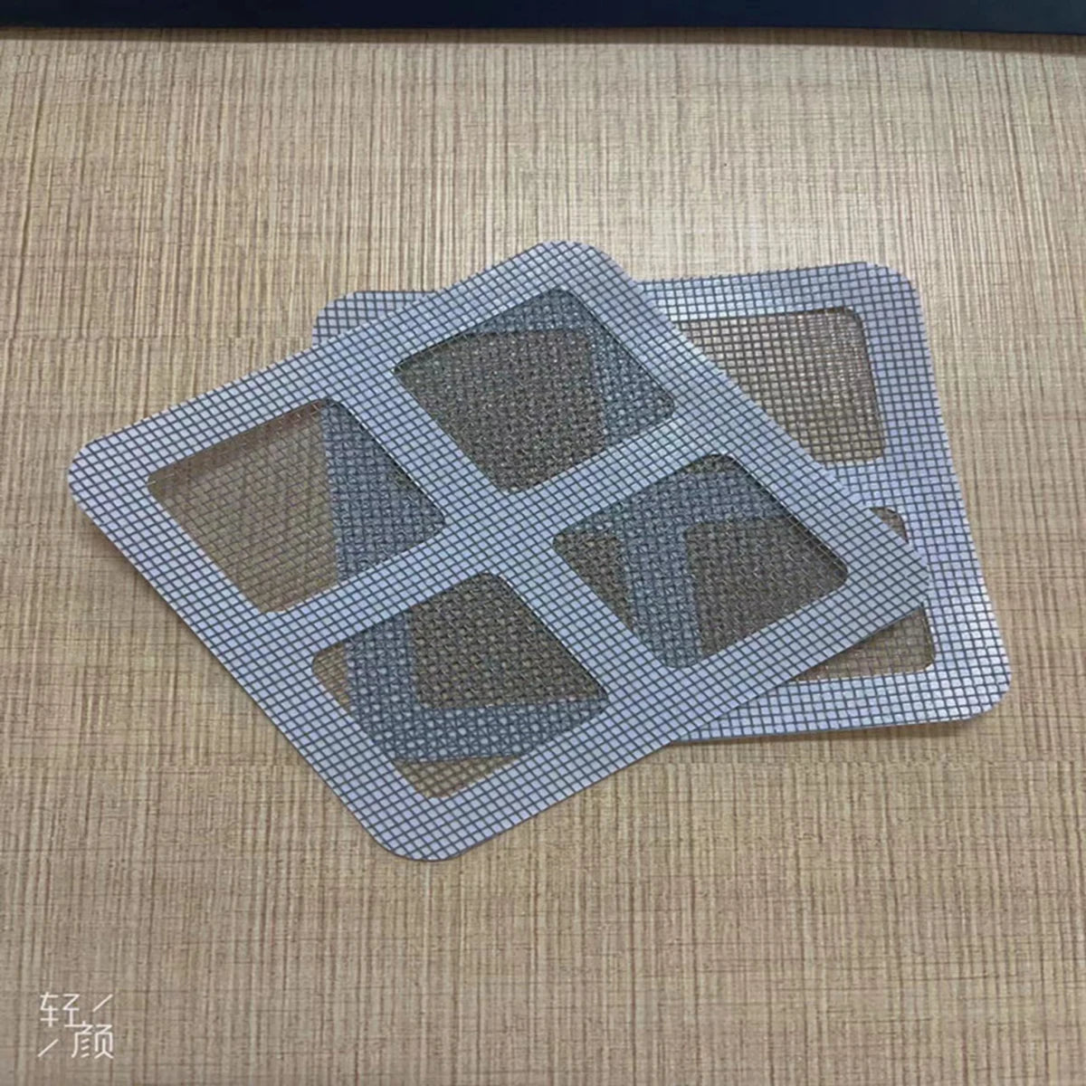 Disposable shower drain hair catcher with a self-adhesive design to prevent clogging and keep drains clean.