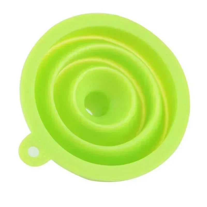 A compact, foldable silicone funnel designed for easy pouring and space-saving storage in the kitchen.