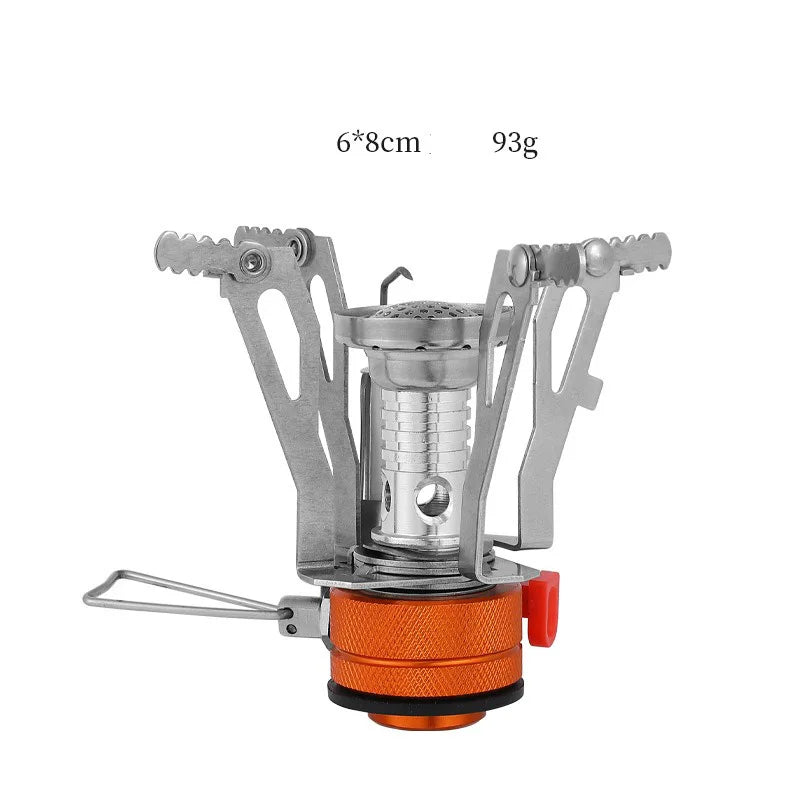 Ultra-light foldable outdoor camping stove with high-efficiency burner for hiking, backpacking, and survival cooking.