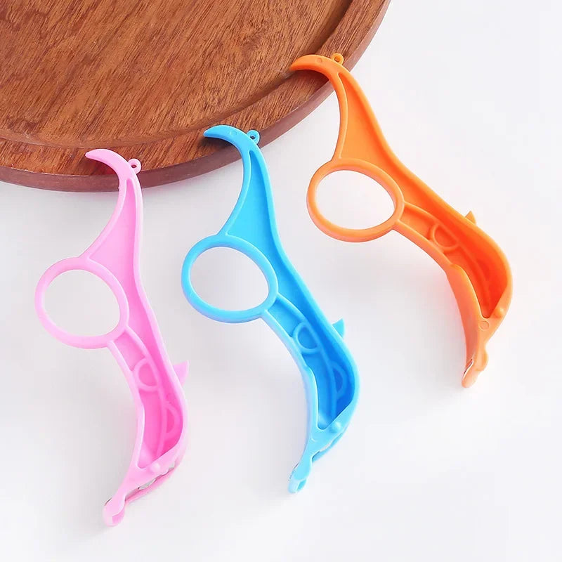 Stainless steel fruit peeler with a sharp rotating blade for effortless peeling of fruits and vegetables.