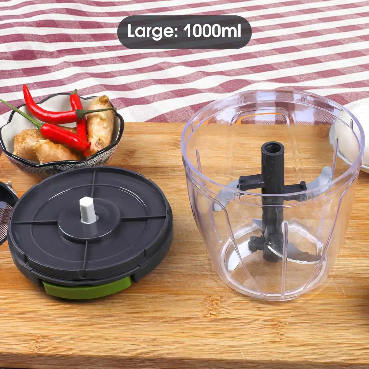 Multipurpose vegetable chopper with interchangeable blades for dicing, slicing, and grating.