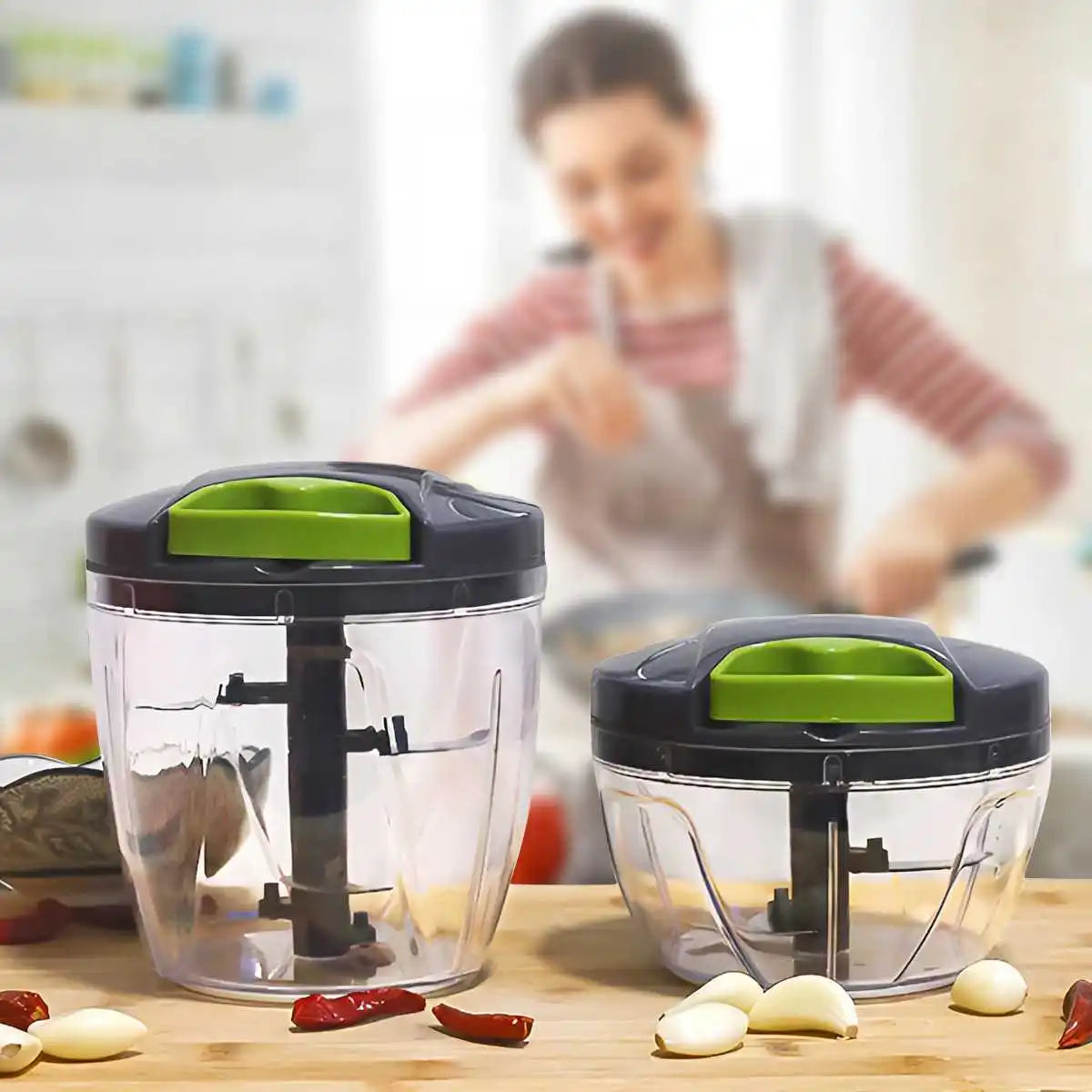 Multipurpose vegetable chopper with interchangeable blades for dicing, slicing, and grating.