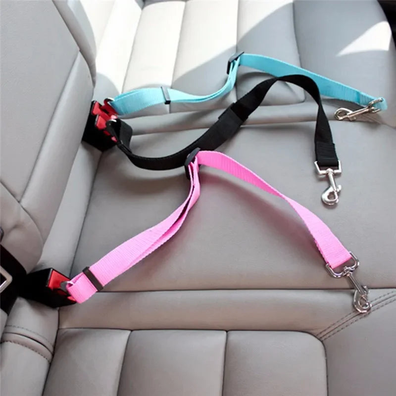 A durable, adjustable pet car seat belt harness with a secure clip for safe travel with dogs and cats.