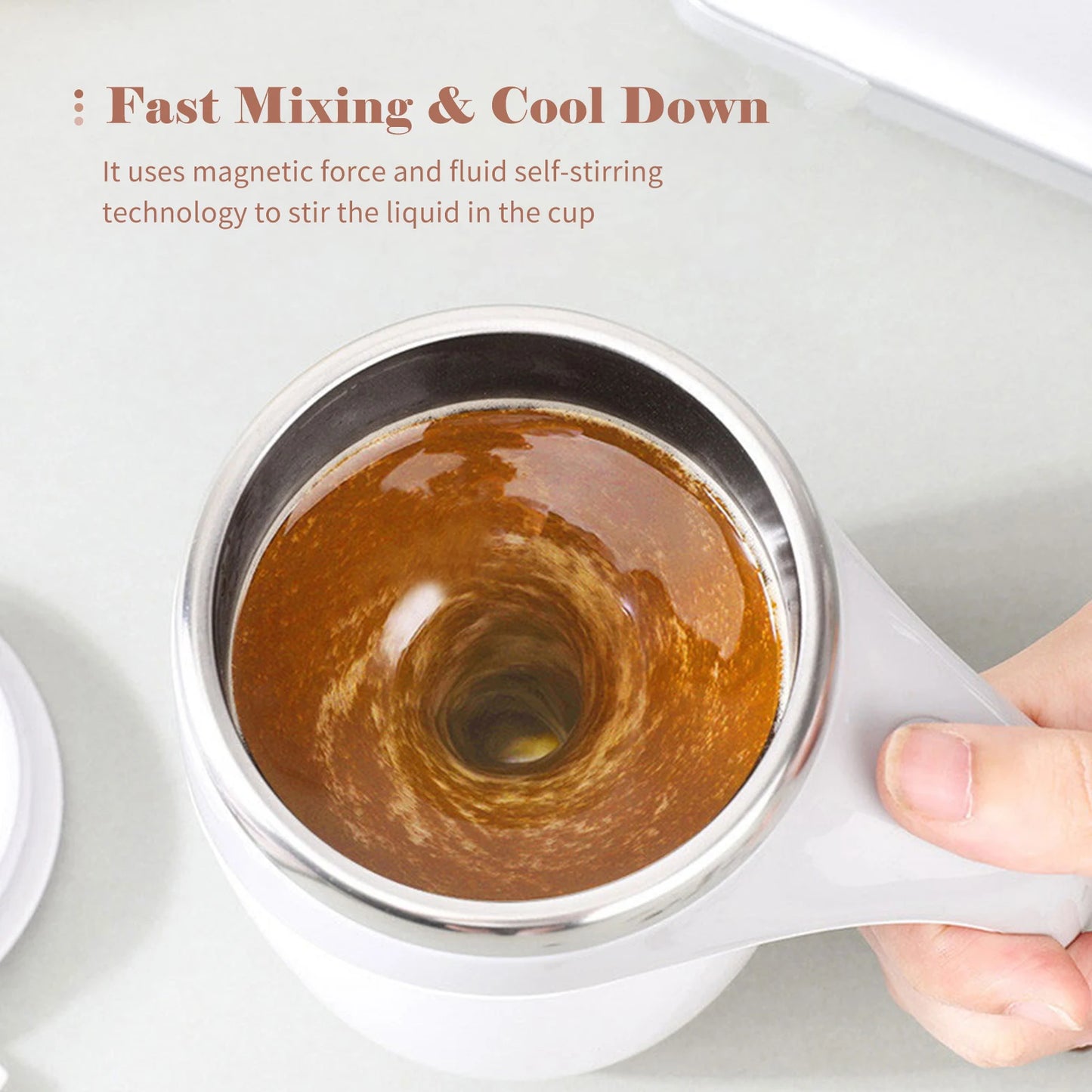 Self-stirring magnetic mug with a rechargeable battery for easy mixing of coffee, tea, and drinks.