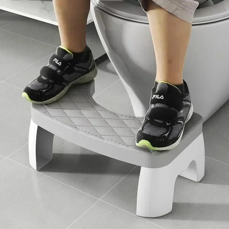 Ergonomic toilet squat stool designed to improve posture and promote healthy digestion.